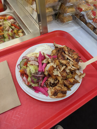 Photo of Shawarmania Cuisine Mediterraneenne - 896 Rue Sherbrooke O, Montréal, QC H3A 1G3