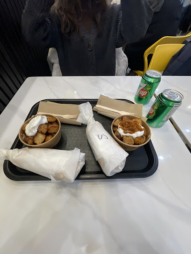 Photo of Shawarmania Cuisine Mediterraneenne - 896 Rue Sherbrooke O, Montréal, QC H3A 1G3