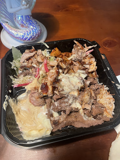 Photo of Restaurant Boustan - 8525 Bd Saint-Michel, Montréal, QC H1Z 3E7