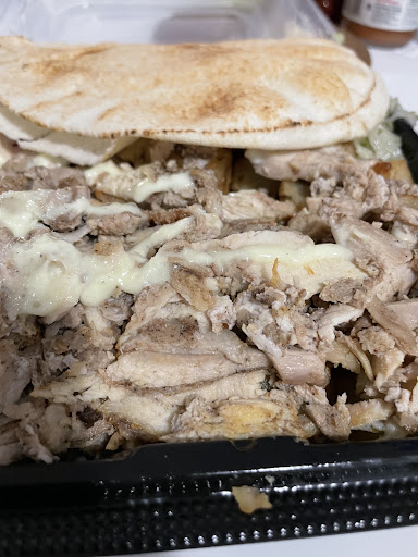 Photo of Restaurant Boustan - 8525 Bd Saint-Michel, Montréal, QC H1Z 3E7