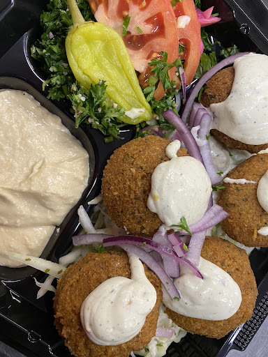 Photo of Restaurant Boustan - 3417 Rue Ontario E, Montréal, QC H1W 1R1