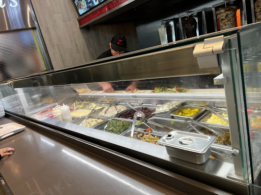 Photo of Zouki's - 3035 Boul. le Carrefour local F005, Laval, QC H7T 1C8