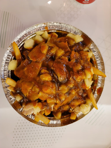 Photo of Zouki's - 3035 Boul. le Carrefour local F005, Laval, QC H7T 1C8