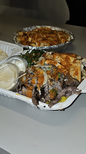 Photo of Zouki's - 3035 Boul. le Carrefour local F005, Laval, QC H7T 1C8