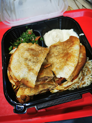 Photo of Restaurant Boustan - 1355 Bd Michèle-Bohec Suite 104, Blainville, QC J7C 0M4