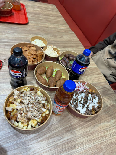 Photo of Restaurant Boustan - 1355 Bd Michèle-Bohec Suite 104, Blainville, QC J7C 0M4