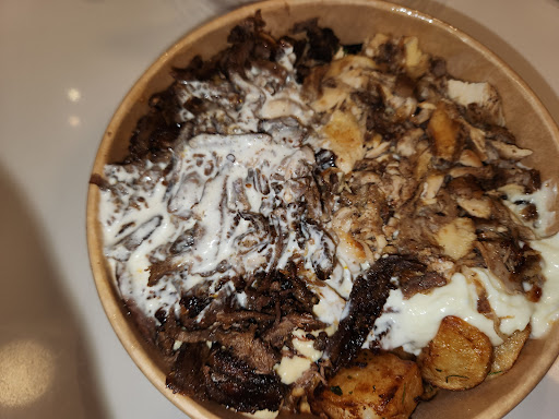 Photo of Restaurant Boustan - 6366 R. Sherbrooke E, Montréal, QC H1N 3P6