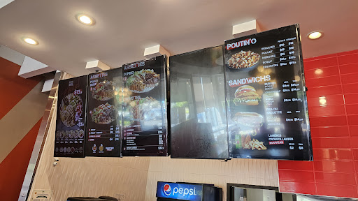 Photo of Grillades Torino Dix30 - 8015 Bd du Quartier Suite 101, Brossard, QC J4Y 0N6
