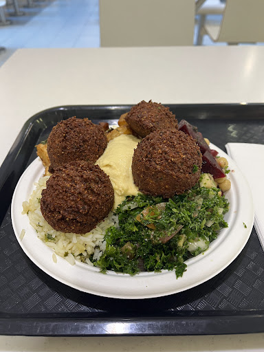 Photo of Basha Restaurant - Place Dupuis, 845 Rue Sainte-Catherine E, Montréal, QC H2L 2E3