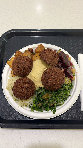 Photo of Basha Restaurant - Place Dupuis, 845 Rue Sainte-Catherine E, Montréal, QC H2L 2E3