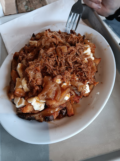 Photo of Poutine Centrale - 3971 Rue Hochelaga, Montréal, QC H1W 1K2