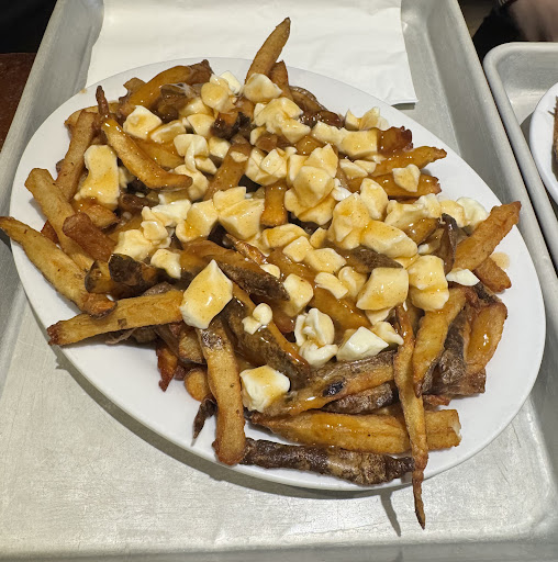 Photo of Poutine Centrale - 3971 Rue Hochelaga, Montréal, QC H1W 1K2