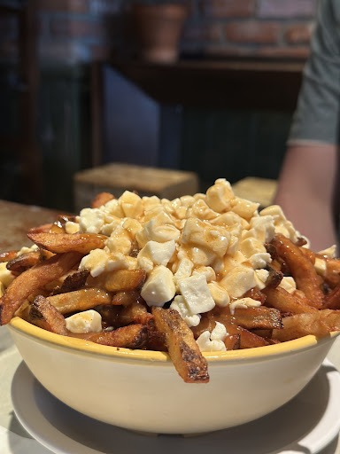 Photo of Poutine Centrale - 3971 Rue Hochelaga, Montréal, QC H1W 1K2
