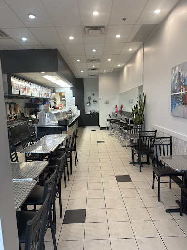 Photo of Amir - 564 Voie De La Desserte Suite 400, Saint-Constant, QC J5A 2S6