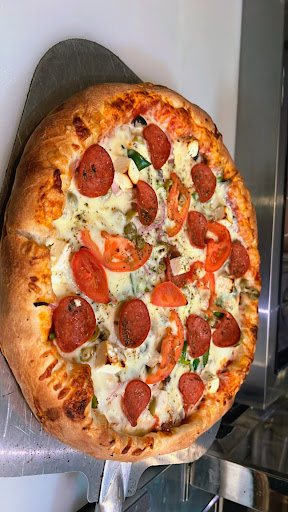 Photo of Mido's Pizza & Shawarma - 293 Rue Notre Dame, Gatineau, QC J8P 1K9