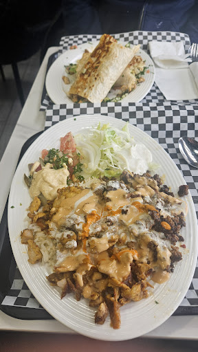 Photo of Open Mic Cuisine Xpress & Grill (Shah Grill & Shawarma) - 4099 Erin Mills Pkwy #10, Mississauga, ON L5L 3P9