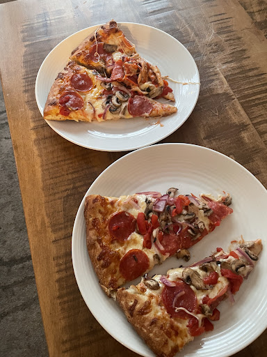 Photo of National Pizza & wings - 870 Upper James St, Hamilton, ON L9C 7N1