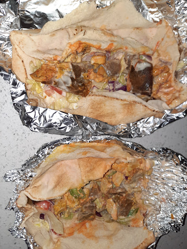 Photo of Plaza Pizza & Wings - 90 Wellington St N, Hamilton, ON L8R 2N2