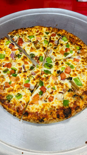 Photo of Great Canadian Pizza & Butter Chicken Hut - Macleod - Great Canadian Pizza, 607 Macleod Trl SE, Calgary, AB T2G 0G4
