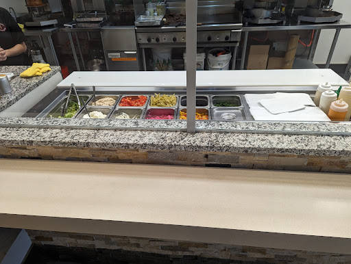 Photo of AL-Madina Shawarma - 7519 Macleod Trl SW, Calgary, AB T2H 0L8