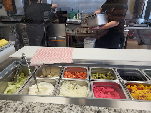 Photo of AL-Madina Shawarma - 7519 Macleod Trl SW, Calgary, AB T2H 0L8