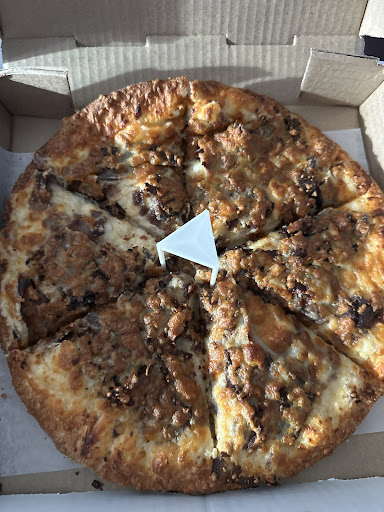 Photo of Cosmic Pizza and Donair - 2439 54 Ave SW #20a, Calgary, AB T3E 1M4