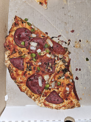 Photo of Cosmic Pizza and Donair - 2439 54 Ave SW #20a, Calgary, AB T3E 1M4