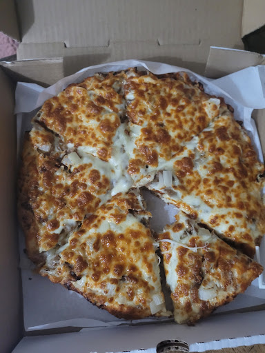 Photo of Cosmic Pizza and Donair - 2439 54 Ave SW #20a, Calgary, AB T3E 1M4