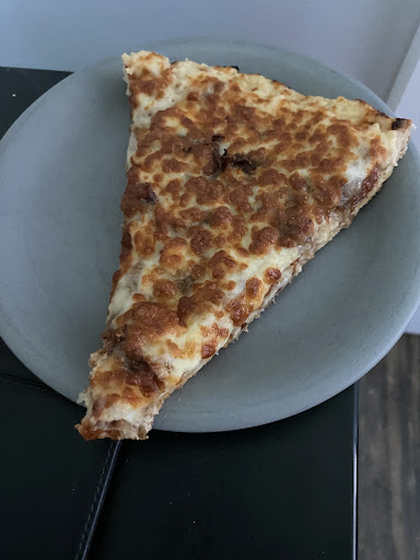 Photo of Cosmic Pizza and Donair - 2439 54 Ave SW #20a, Calgary, AB T3E 1M4