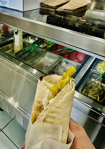 Photo of Poulet Mankal - 12174 Blvd. Laurentien, Montreal, QC H4K 1M9