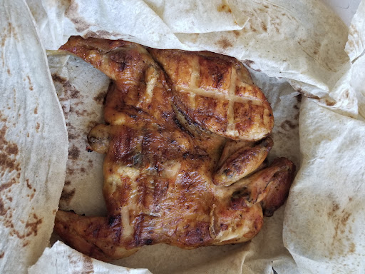 Photo of Poulet Mankal - 12174 Blvd. Laurentien, Montreal, QC H4K 1M9