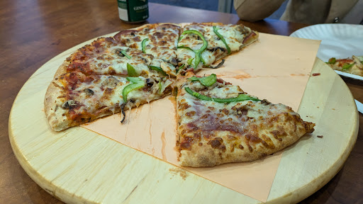 Photo of Pizza les Frères - 784 Bd du Curé-Labelle #40, Laval, QC H7V 2V3