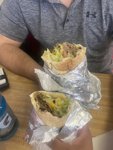 Photo of Fine Pizza and Donair Edmonton - 8015 Wagner Rd NW, Edmonton, AB T6E 4N6