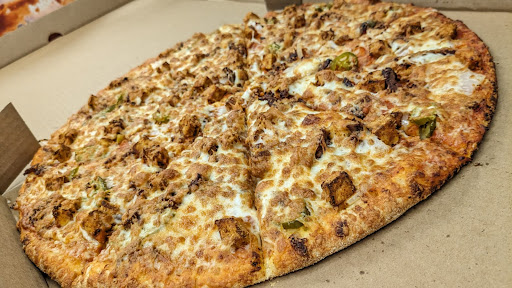 Photo of Cosmic Pizza & Donair - 727 Daniels Way SW, Edmonton, AB T6W 1A7