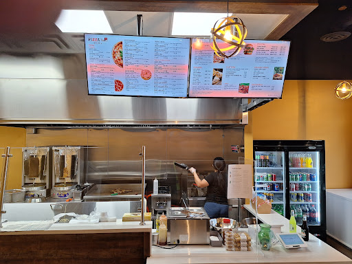 Photo of Pizza Talks & Donair - 3518 Ewing Trail SW, Edmonton, AB T6X 2X6
