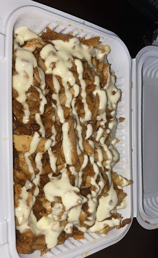 Photo of Pizza Talks & Donair - 3518 Ewing Trail SW, Edmonton, AB T6X 2X6