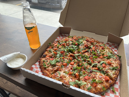 Photo of Pizza Talks & Donair - 3518 Ewing Trail SW, Edmonton, AB T6X 2X6