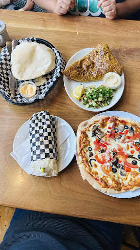 Photo of ALMADINA Woodstone Oven & Grill - 330 The Boardwalk, Waterloo, ON N2T 0A6