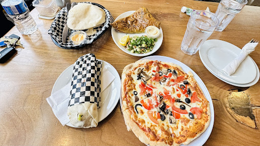 Photo of ALMADINA Woodstone Oven & Grill - 330 The Boardwalk, Waterloo, ON N2T 0A6