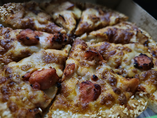 Photo of Red Swan Pizza - Windsor Devonshire Heights - Inside Walker Place next to Dan Dan Asian Diner, 4140 Walker Rd, Windsor, ON N8W 3T5