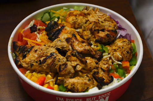 Photo of Poulet Rouge - 2450 Boul Laurier Entrée 4, Québec, QC G1V 2L1