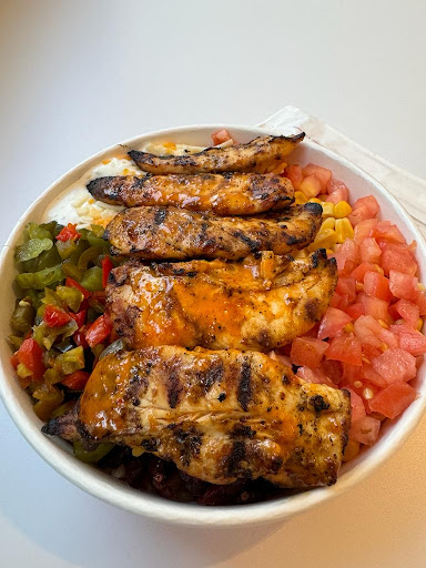 Photo of Poulet Rouge - 2450 Boul Laurier Entrée 4, Québec, QC G1V 2L1