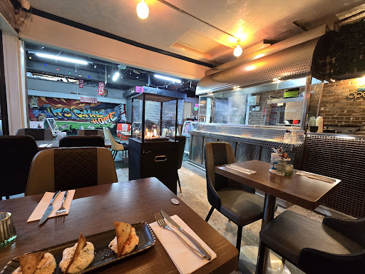 Photo of Broadway BBQ - Entrance, 29 Tooting High St, London SW17 0RJ, UK