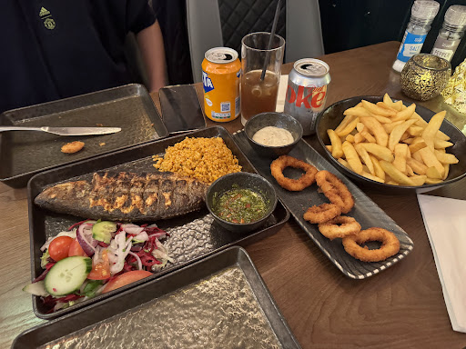 Photo of Broadway BBQ - Entrance, 29 Tooting High St, London SW17 0RJ, UK