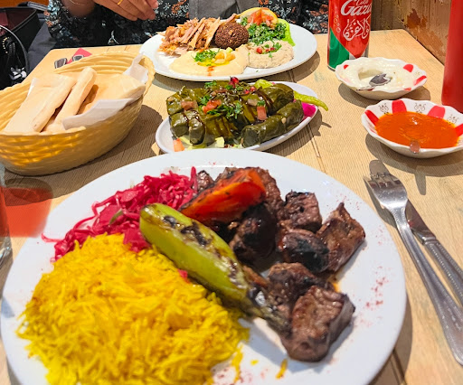 Photo of Hiba Street Food - 10 Tottenham St, London W1T 4RD, UK