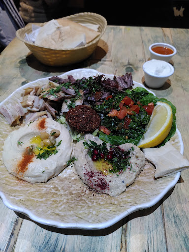 Photo of Hiba Street Food - 10 Tottenham St, London W1T 4RD, UK