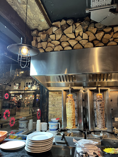 Photo of Hiba Street Food - 10 Tottenham St, London W1T 4RD, UK