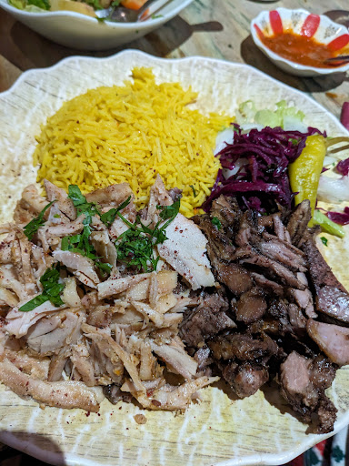 Photo of Hiba Street Food - 10 Tottenham St, London W1T 4RD, UK