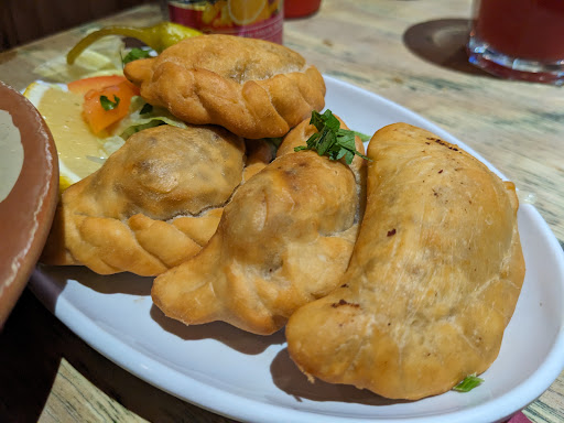 Photo of Hiba Street Food - 10 Tottenham St, London W1T 4RD, UK