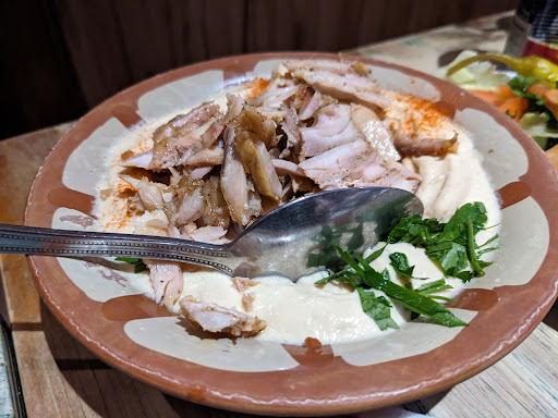 Photo of Hiba Street Food - 10 Tottenham St, London W1T 4RD, UK
